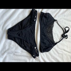 Black target halter bikini, cut out on bottoms size S, top size M